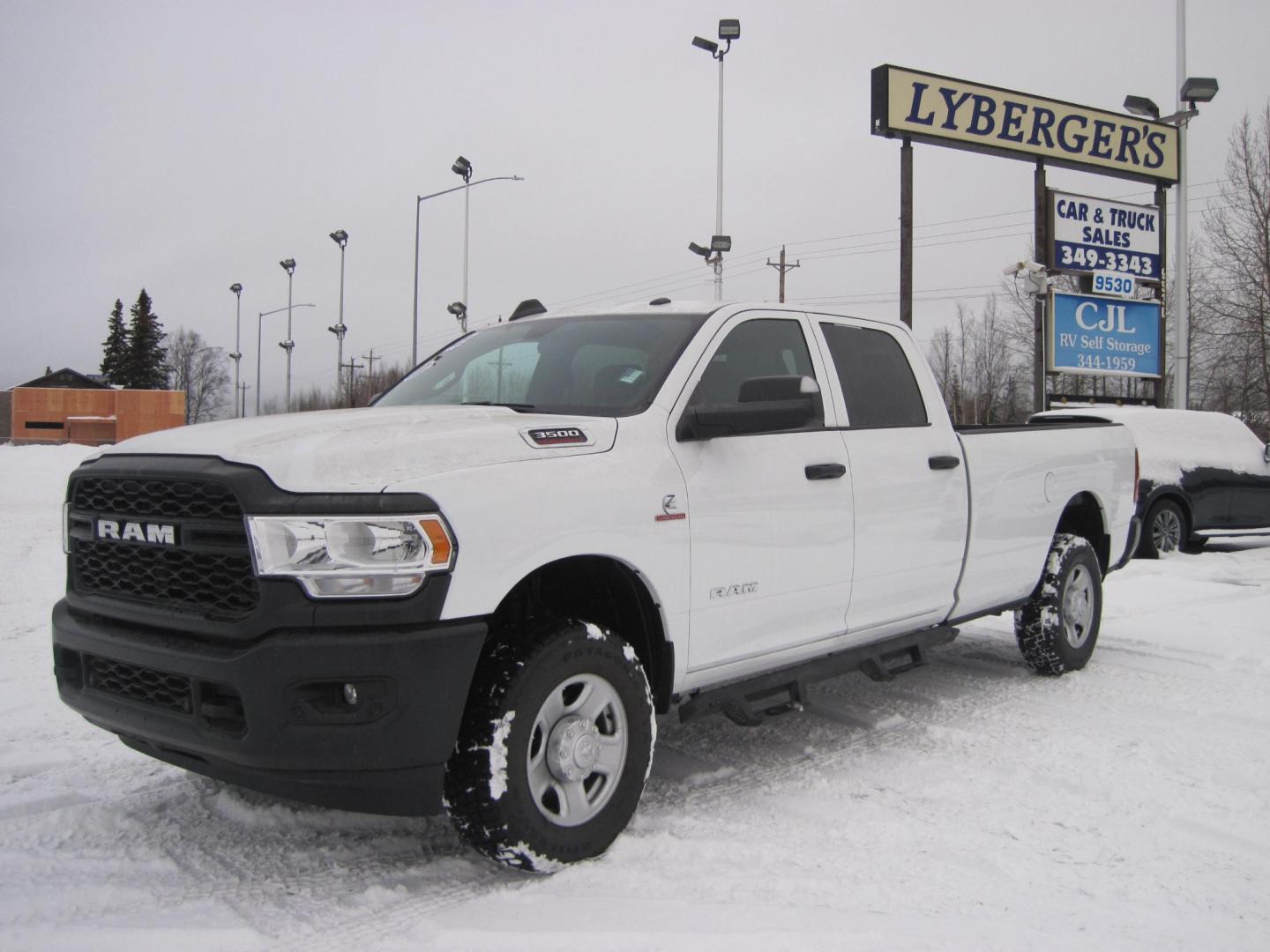 2022 white /gray RAM 3500 Tradesman Crew Cab 4WD (3C63R3GL2NG) with an 6.7L L6 OHV 24V TURBO DIESEL engine, 6A transmission, located at 9530 Old Seward Highway, Anchorage, AK, 99515, (907) 349-3343, 61.134140, -149.865570 - Nice Ram 3500 Longbed come take a test drive - Photo#0